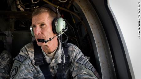 Commander General Stanley McChrystal sits in the helicopter after a lengthy conference meeting with military officials in October 2009 at forward operating base Walton, outside of Kandahar, Afghanistan. 